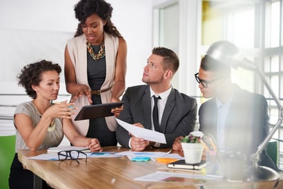 team of successful business people having a meeting in executive sunlit office team of successful business people having a meeting in executive sunlit office